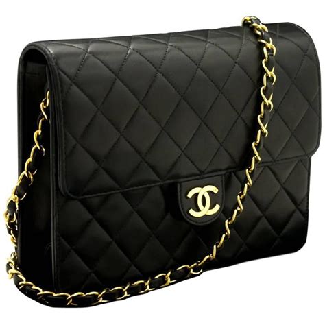 chanel black quilted leather clutch price|Chanel clutch with chain lambskin.